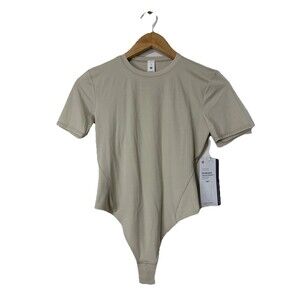 Lululemon Wundermost CreW-Neck  Bodysuit Nulu Short Sleeve Thong Size S Bone